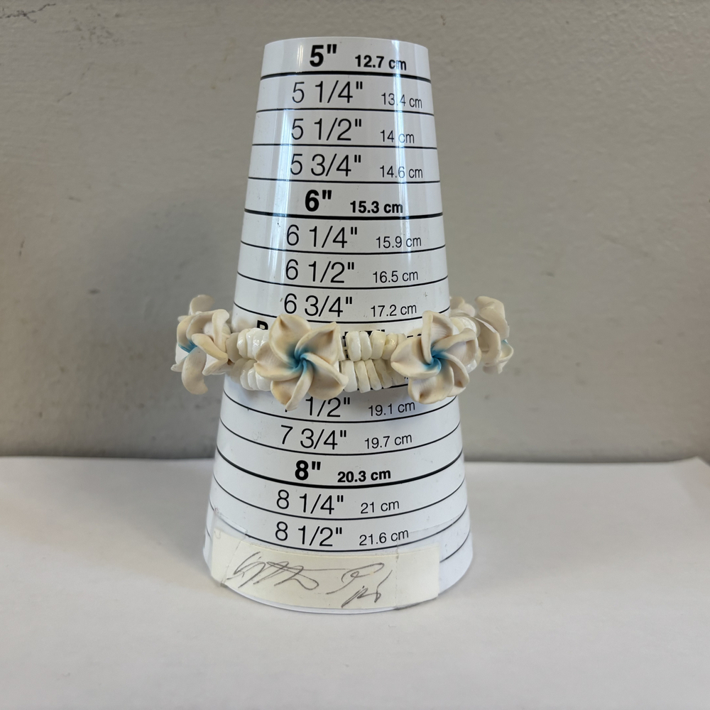 Beachy Carved Faux Bone & Blue Plumeria Flower Bracelet